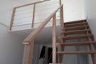Réalisation d'un escalier en frêne par l'entreprise ML OSSATURE située à Quincy-Voisins (Île-de-France)