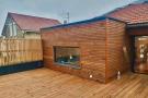 Réalisation d'un toit-terrasse et d'une extension en ossature bois par l'entreprise ML OSSATURE située à Quincy-voisins 77860 
