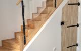 Pose d'un escalier en bois par l'entreprise ML OSSATURE située à Quincy-Voisins (Île-de-France)
