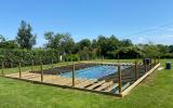 Construction en cours d'une terrasse en bois pour piscine par l'entreprise ML OSSATURE située à Quincy-voisins 77860 